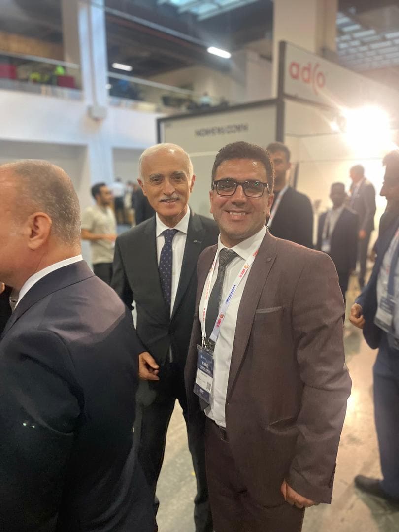 Hüsnü Özden مع رئيس DEİK السيد Nail Olpak